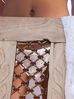 Alyshia Kingston takes off her top on a chair