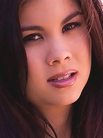 Mai Ly lays on a couch