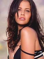 Cali Logan pops out of her black top