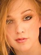 Alaina Fox slides off her pink bra and panties