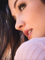 Logan Drae undresses in a shady spot