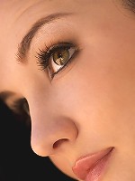 Logan Drae undresses in a shady spot