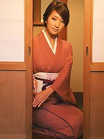 Sexy gravure idol beauty slowly takes off her pink kimono