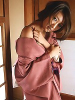 Sexy gravure idol beauty slowly takes off her pink kimono