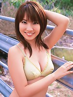 Captivating asian beauty with deliciously plump breasts in bikini