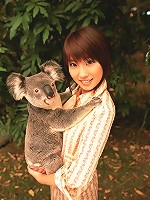 Captivating asian beauty with deliciously plump breasts in bikini