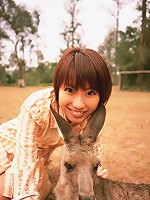 Captivating asian beauty with deliciously plump breasts in bikini