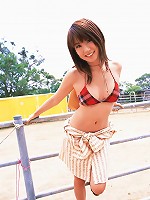 Captivating asian beauty with deliciously plump breasts in bikini