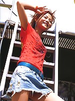 Cute asian girl is flirtatious with her long hair in a dress