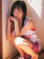 Sweet gravure babe shyly shows her body in t shirts and shorts