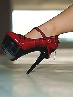 Bryci in a leather suit and red heels! HOT.