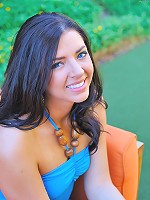 Madeline uses a dildo outside