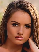 Tori Black uses a blue toy that matches her blue dress