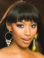 Lovely chocolate honey Bella Moretti spreads her legs and plumps her boobs as she models her see-through fishnet mesh shirt and skirt!