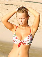 Peach and her big natural tits in a bikini