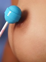 Lizzy teases her audience with a lollipop then gets herself off with a vibrator